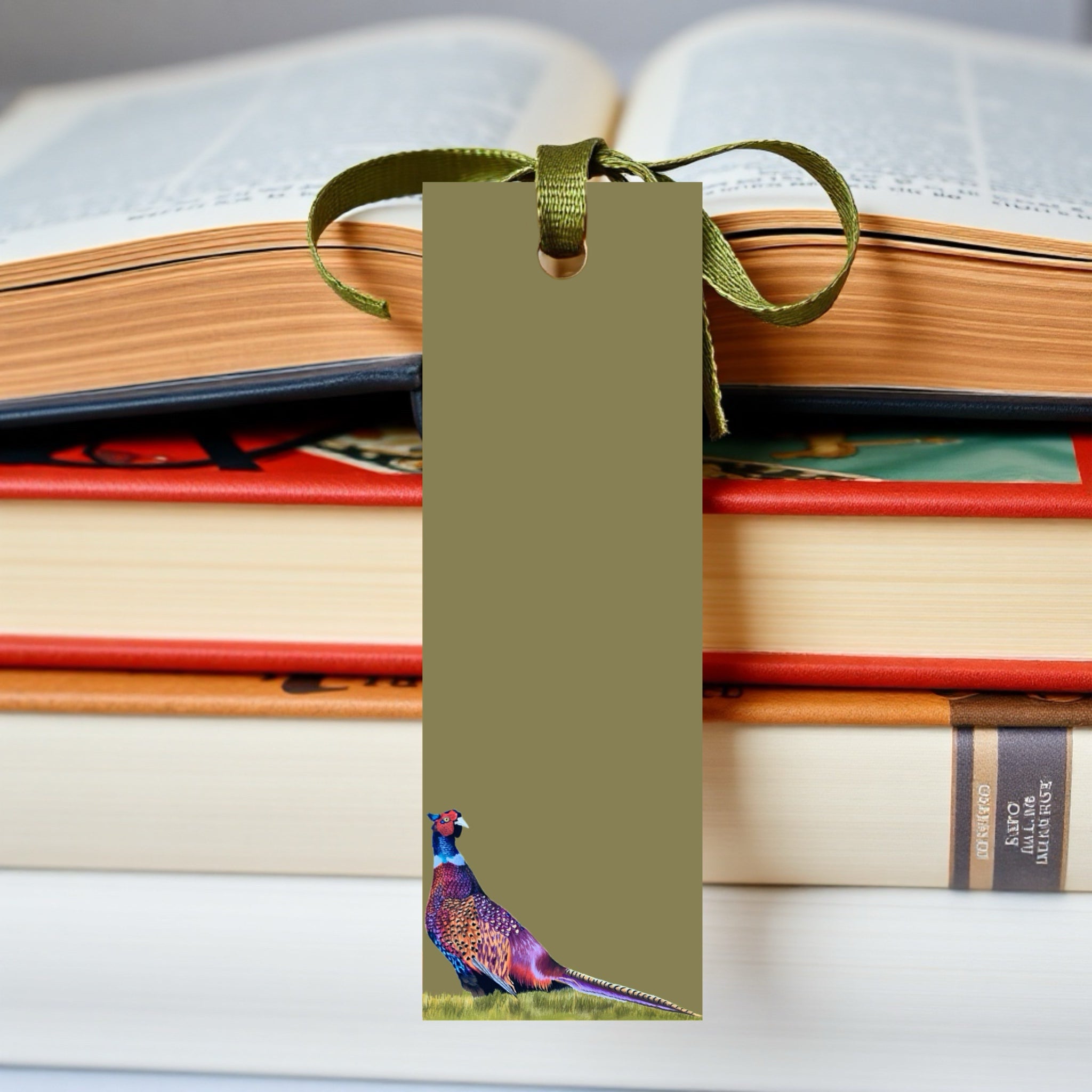 Rustic Bookmark with colourful pheasant illustration on a sage green background with ribbon