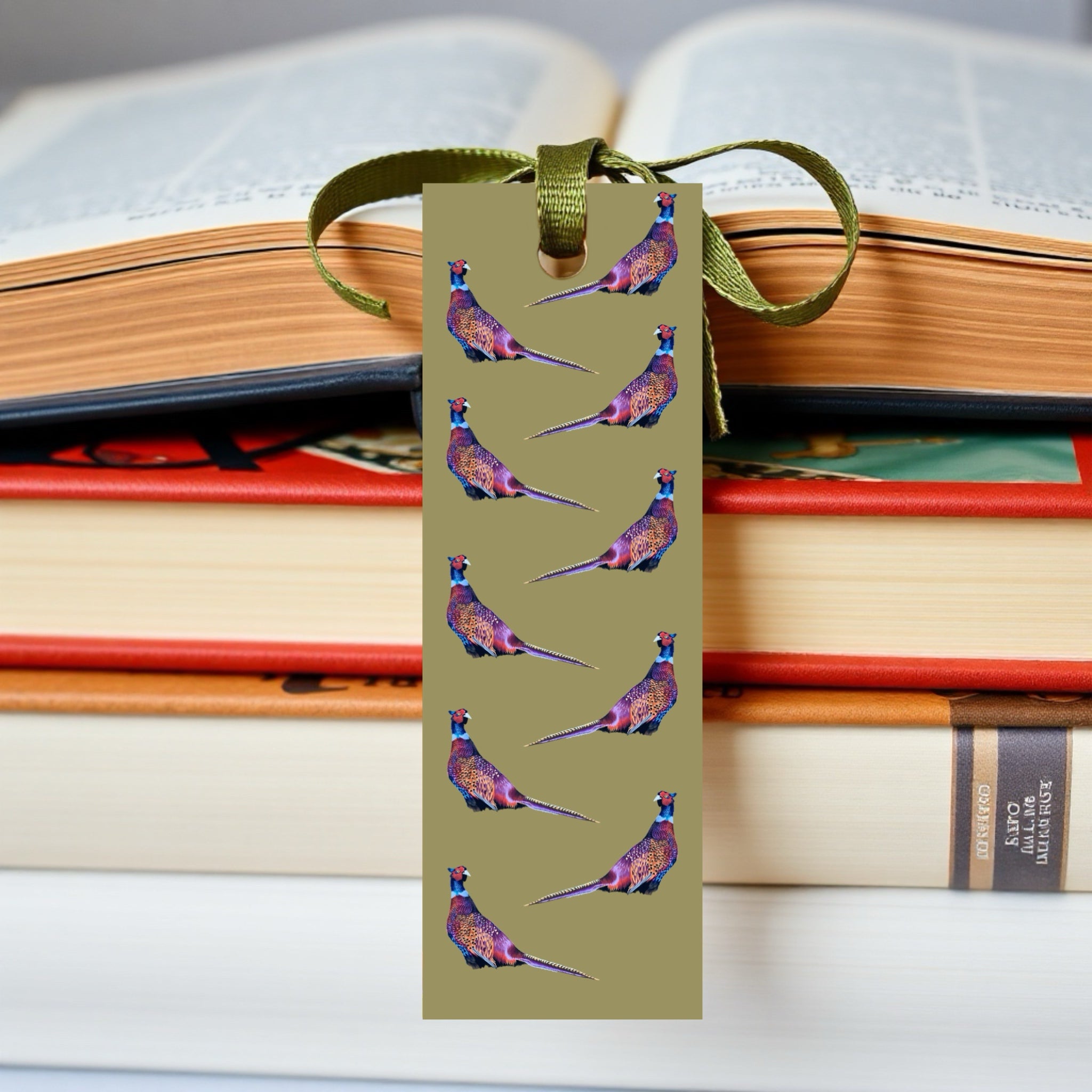 Rustic bookmark with game bird illustrations, sage green background and ribbon